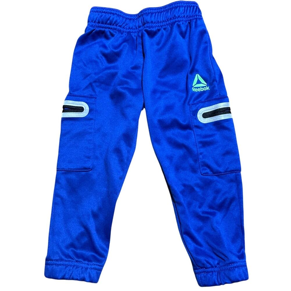Reebok Power Up/Transition jogger pants Mazarine Blue reflective side pockets